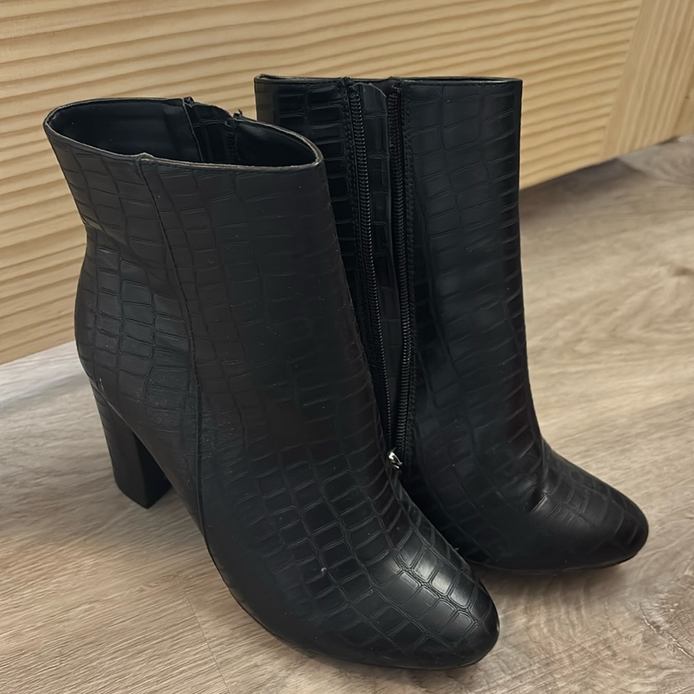 Snakeskin heel booties